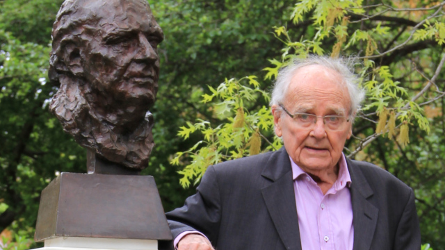 Picture showing John Molony and Sculpture.